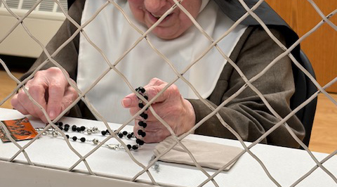 Rosary in hands